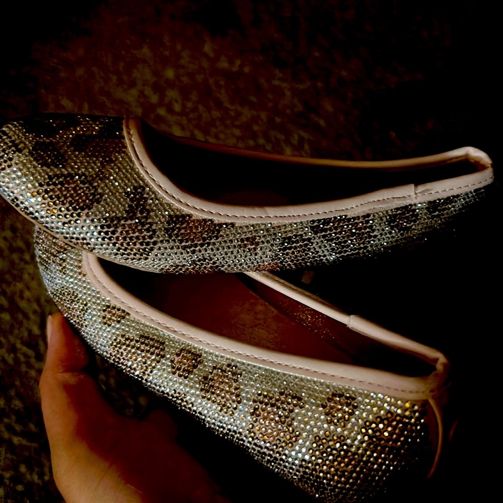 Girls Michael Kors ballet shoes.